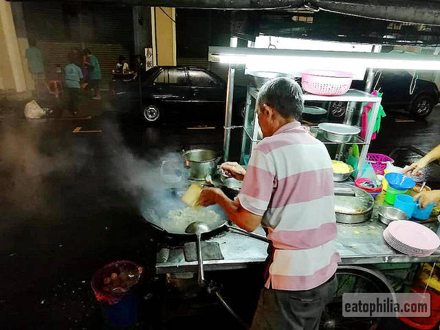 Cooking Char Hor Fun at the Beach Street stall, Penang